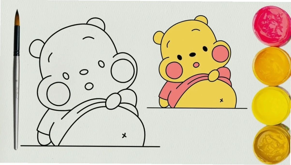 bé đang tô tượng gấu Pooh